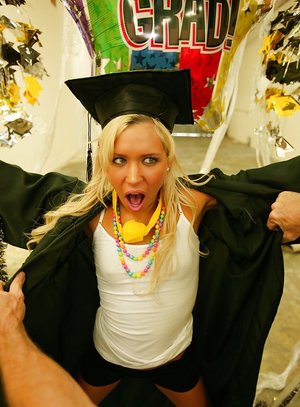 18 year old girl Katie Lewis stands naked after undressing in her bedroom